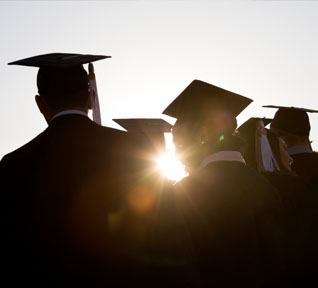 Graduates in cap and gown