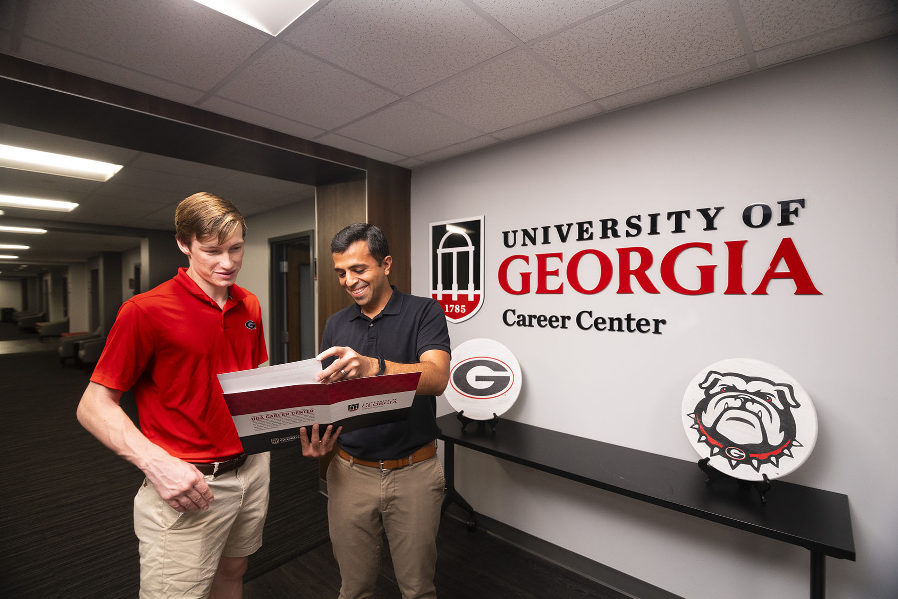 UGA Career Center staff sharing information with a student