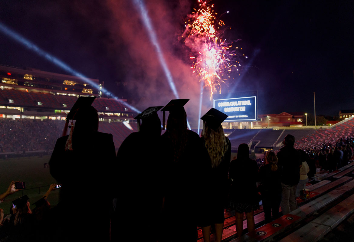 graduates and fireworks at graduation